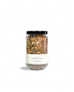 Shade Botanicals Citrus Green loose leaf tea in a 330 mL recycled glass jar back view