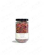 Shade Botanicals Golden Rosella loose leaf tea in a 330 mL recycled glass jar front view