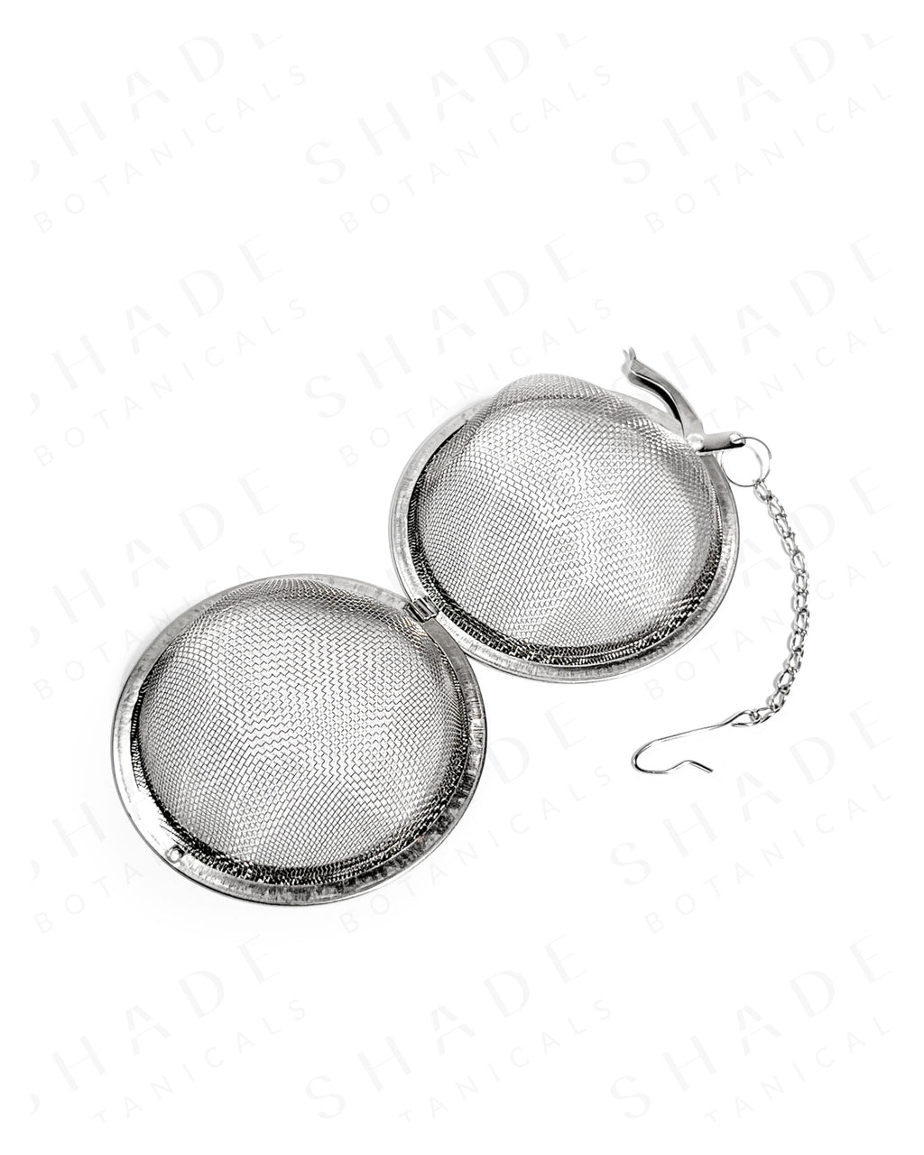 Shade Botanicals stainless steel Grande Brew Globe tea strainer bottom view with parts opened