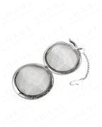 Shade Botanicals stainless steel Grande Brew Globe tea strainer bottom view with parts opened