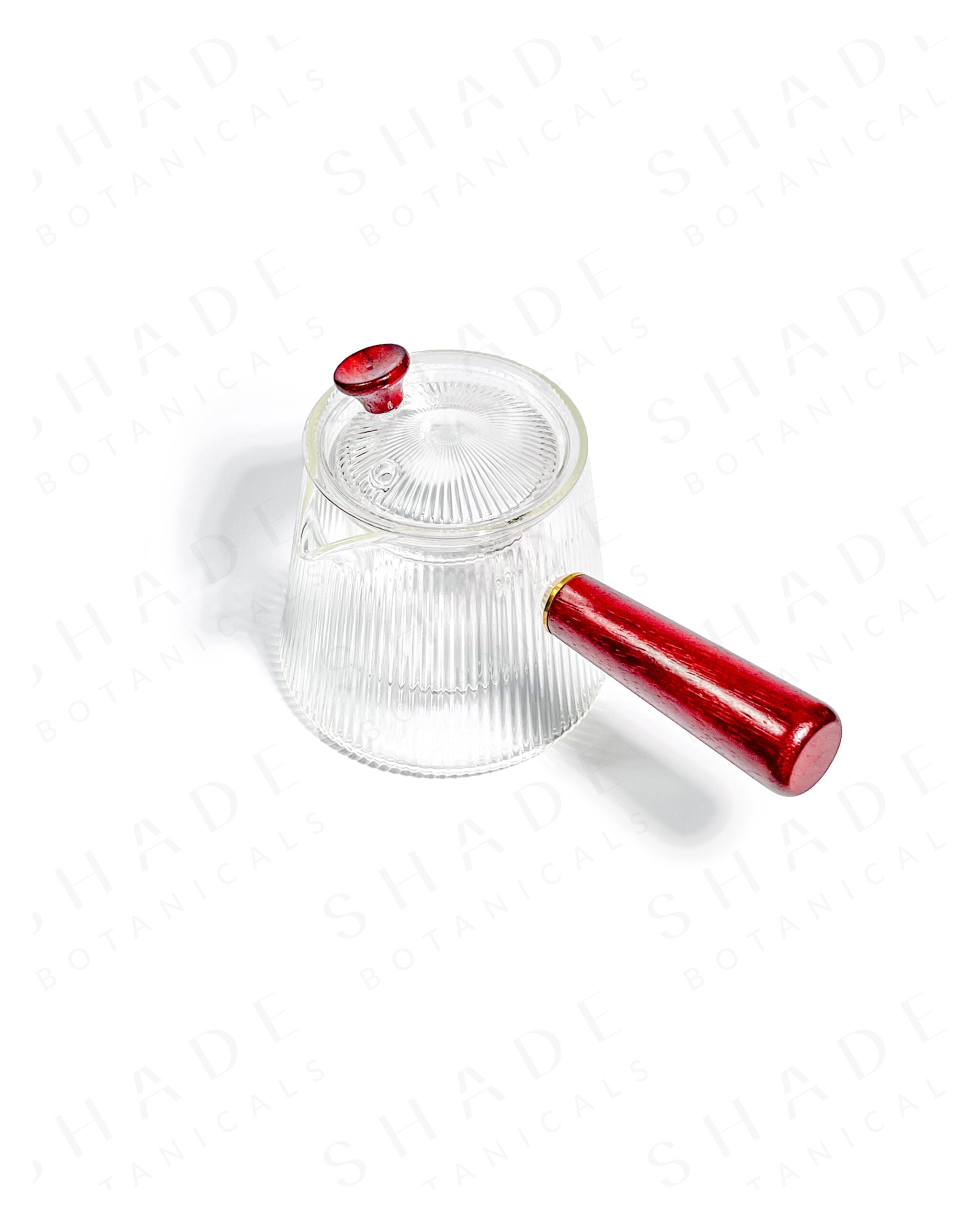 Shade Botanicals red handle serrated teapot top view