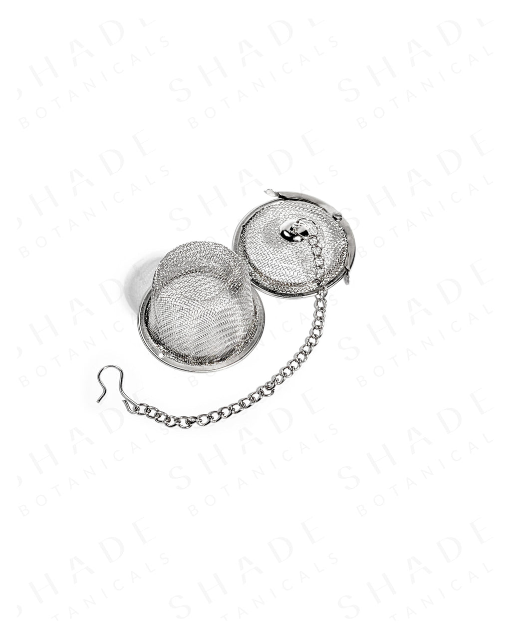 Shade Botanicals stainless steel Steel Brew Sphere tea strainer bottom view with parts opened