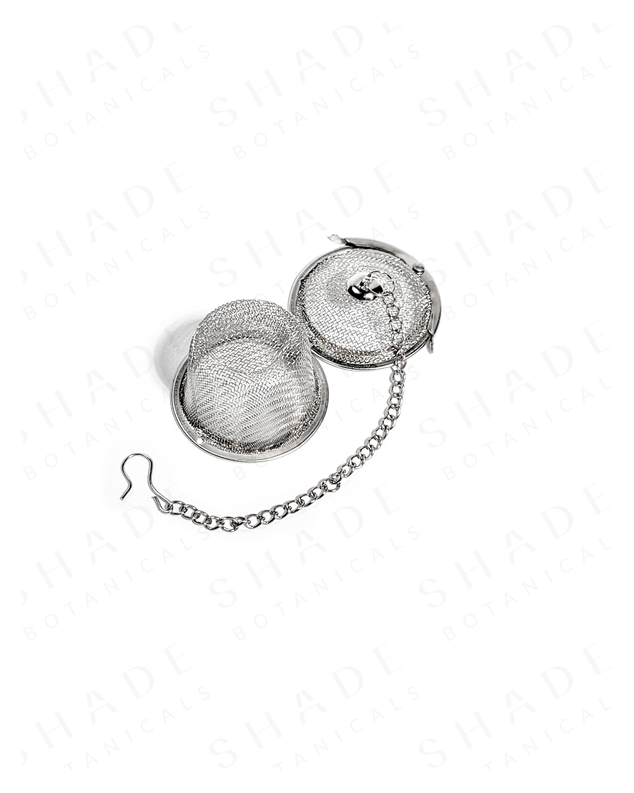 Shade Botanicals stainless steel Steel Brew Sphere tea strainer bottom view with parts opened