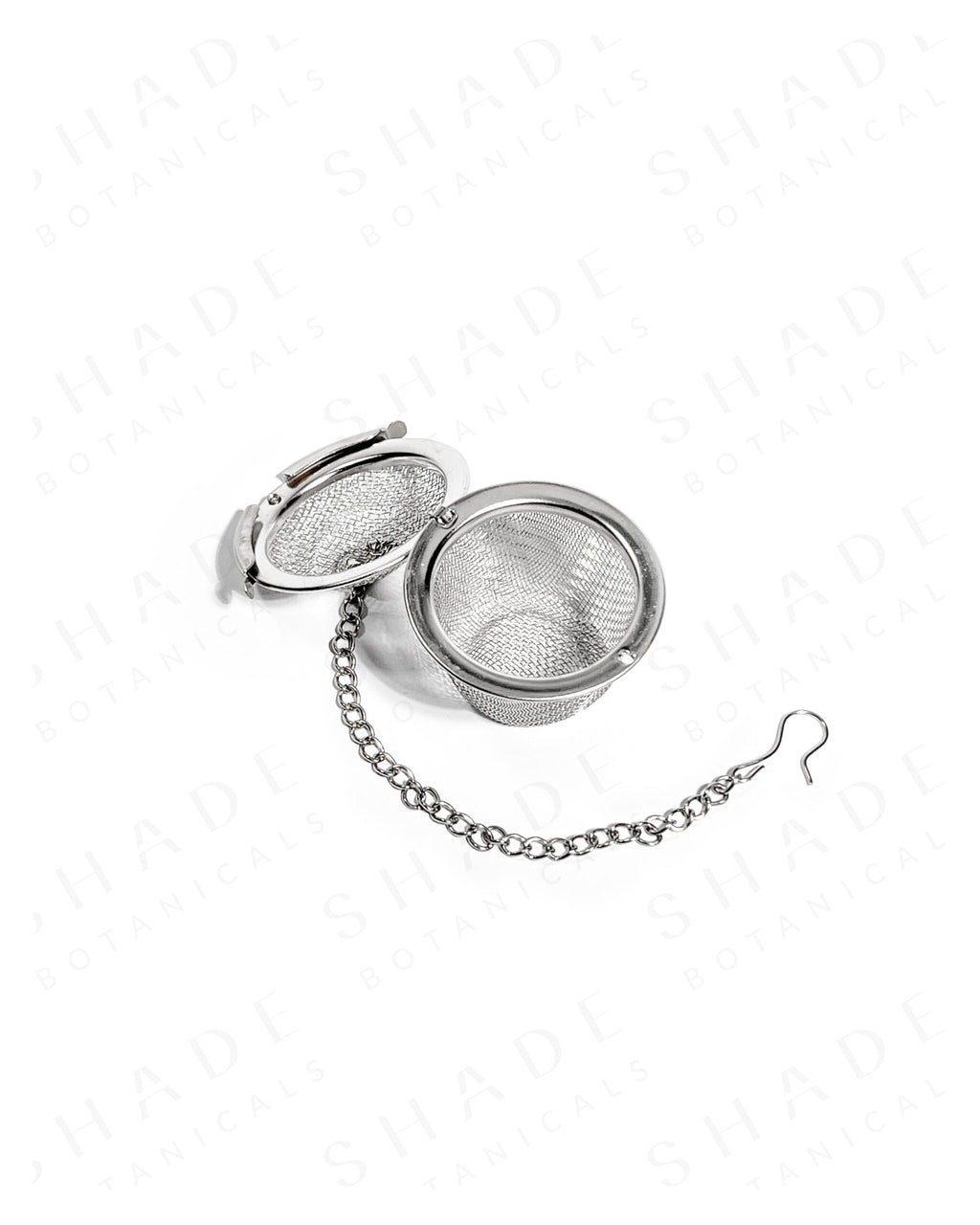 Shade Botanicals stainless steel Steel Brew Sphere tea strainer top view with parts opened