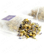 Shade Botanicals Blue Dream loose leaf tea slightly spilled from a small tea pack