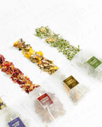 Top view of Shade Botanicals Citrus Green loose leaf tea arranged neatly on a white background