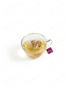 Shade Botanicals Moringa Melody loose leaf tea served in a glass cup