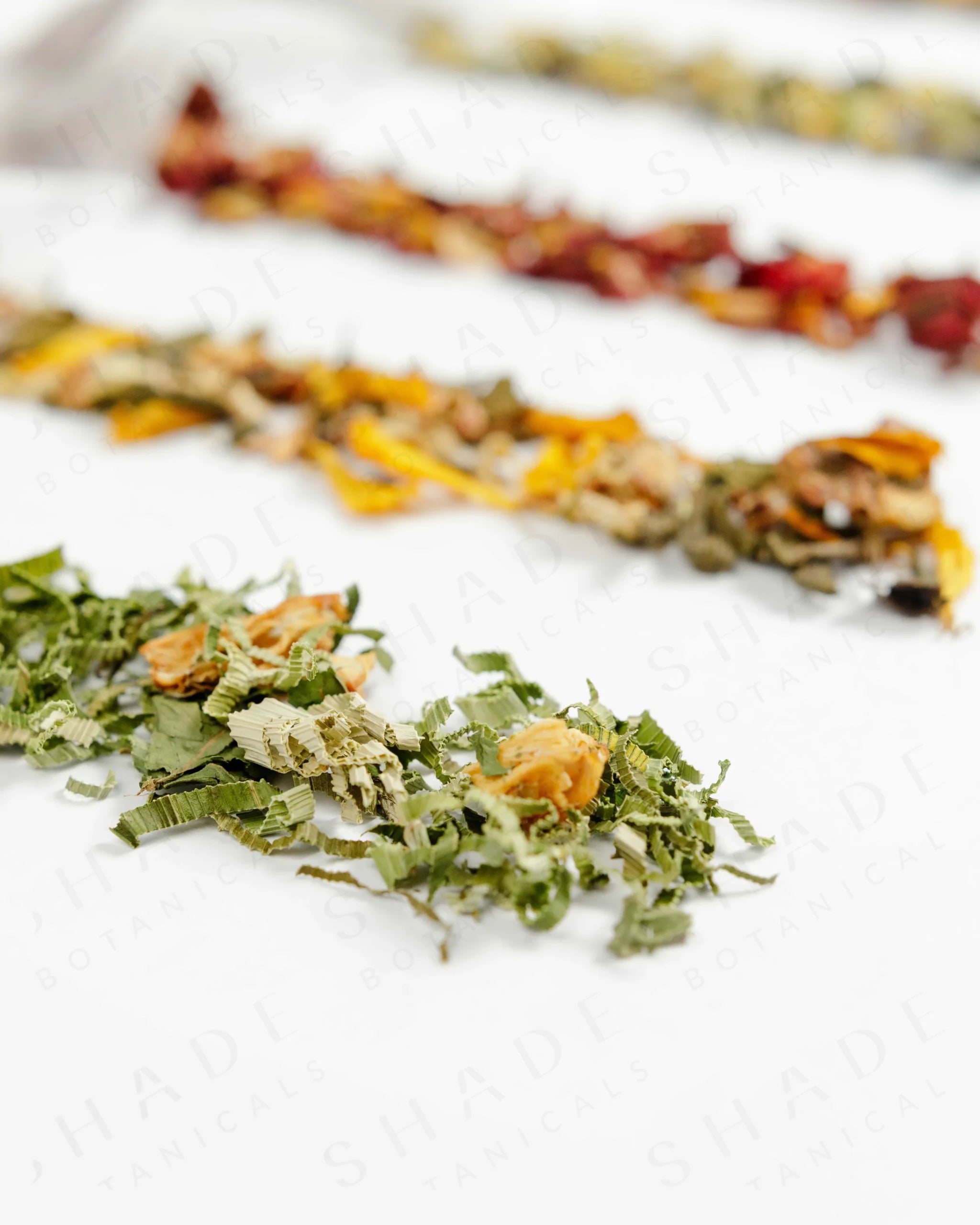 Shade Botanicals Pandan Panacea loose leaf tea arranged neatly on a white background