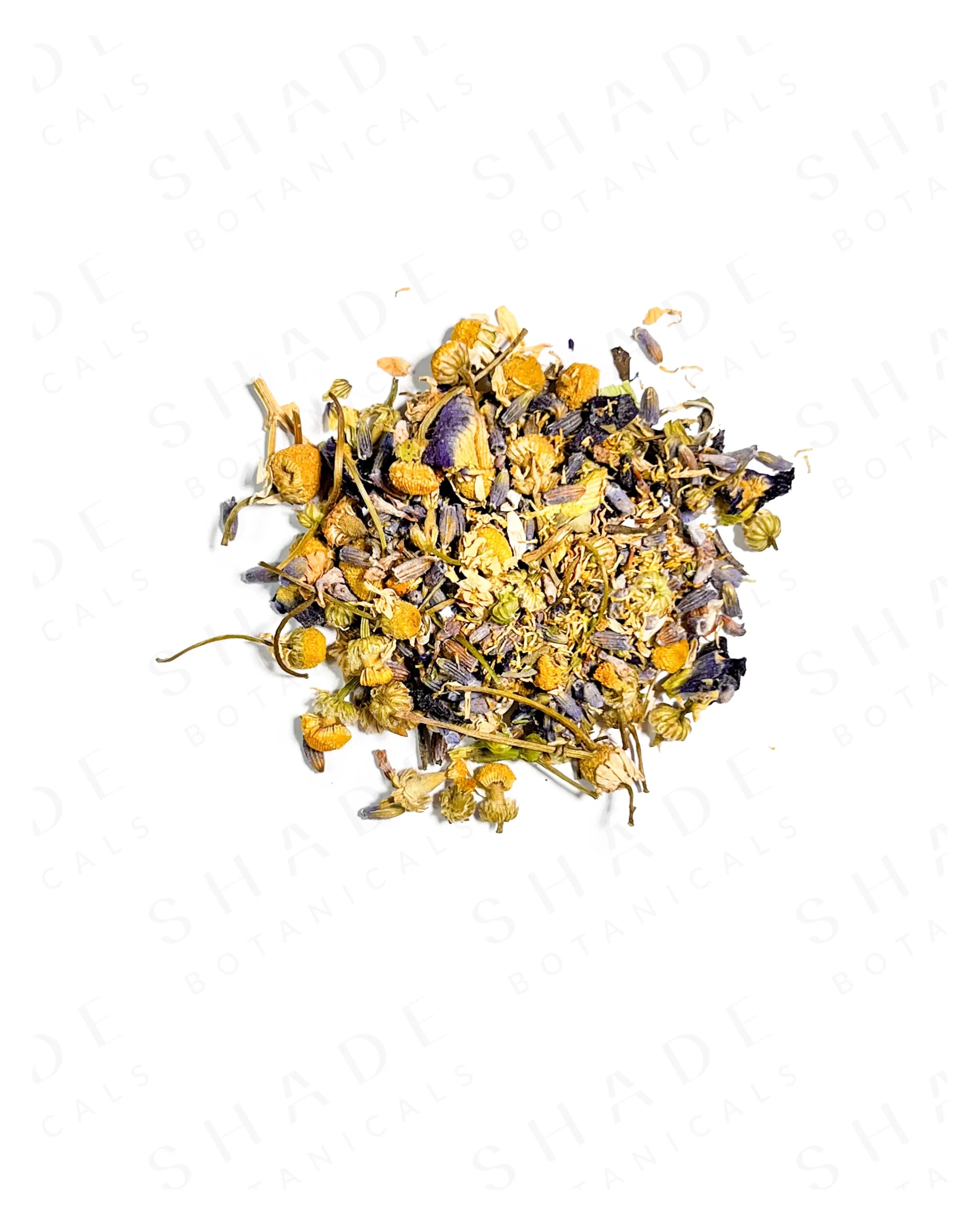 Mixture of dried yellow and purple flowers on a white background