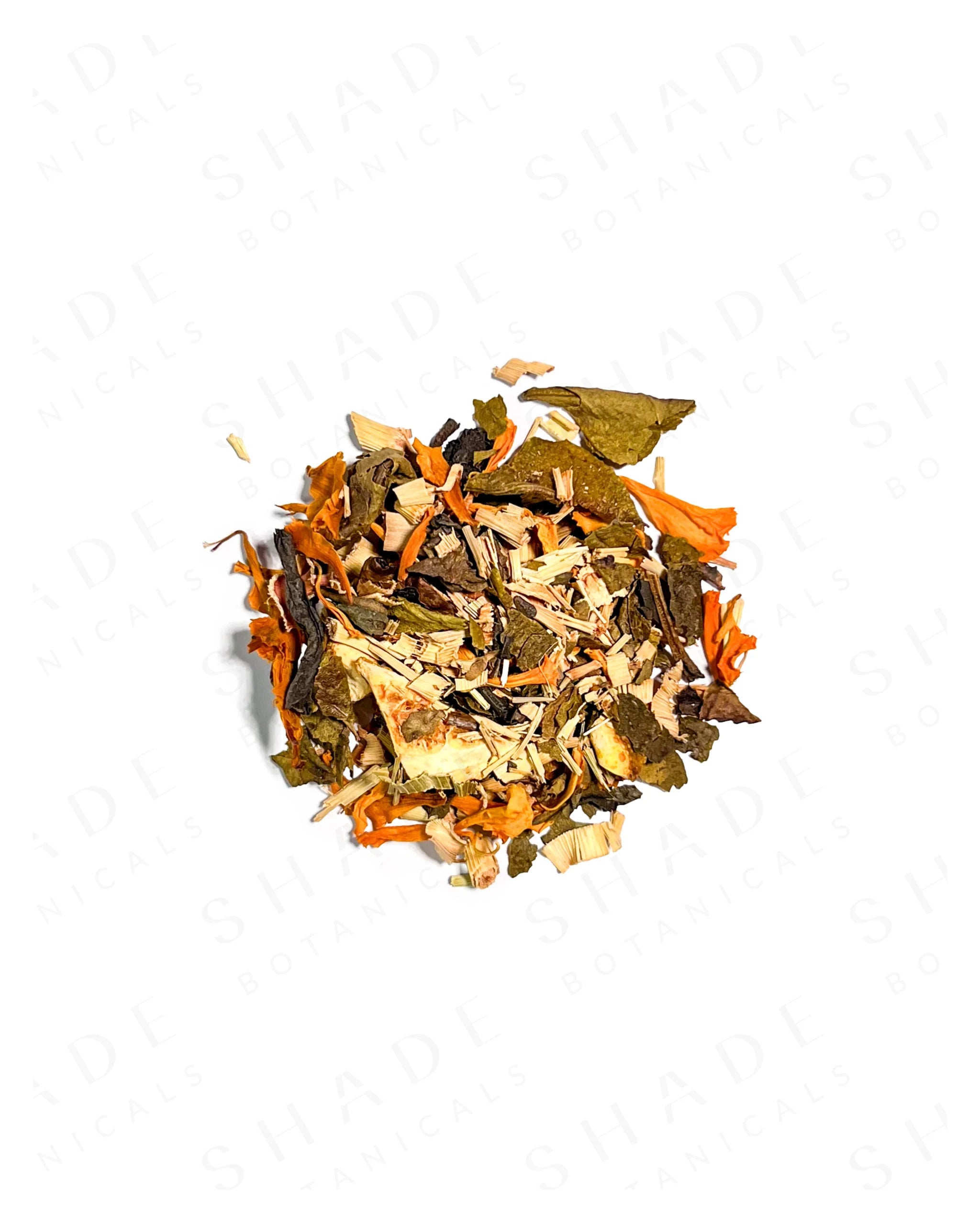 Heap of dried herbs and leaves on a white background