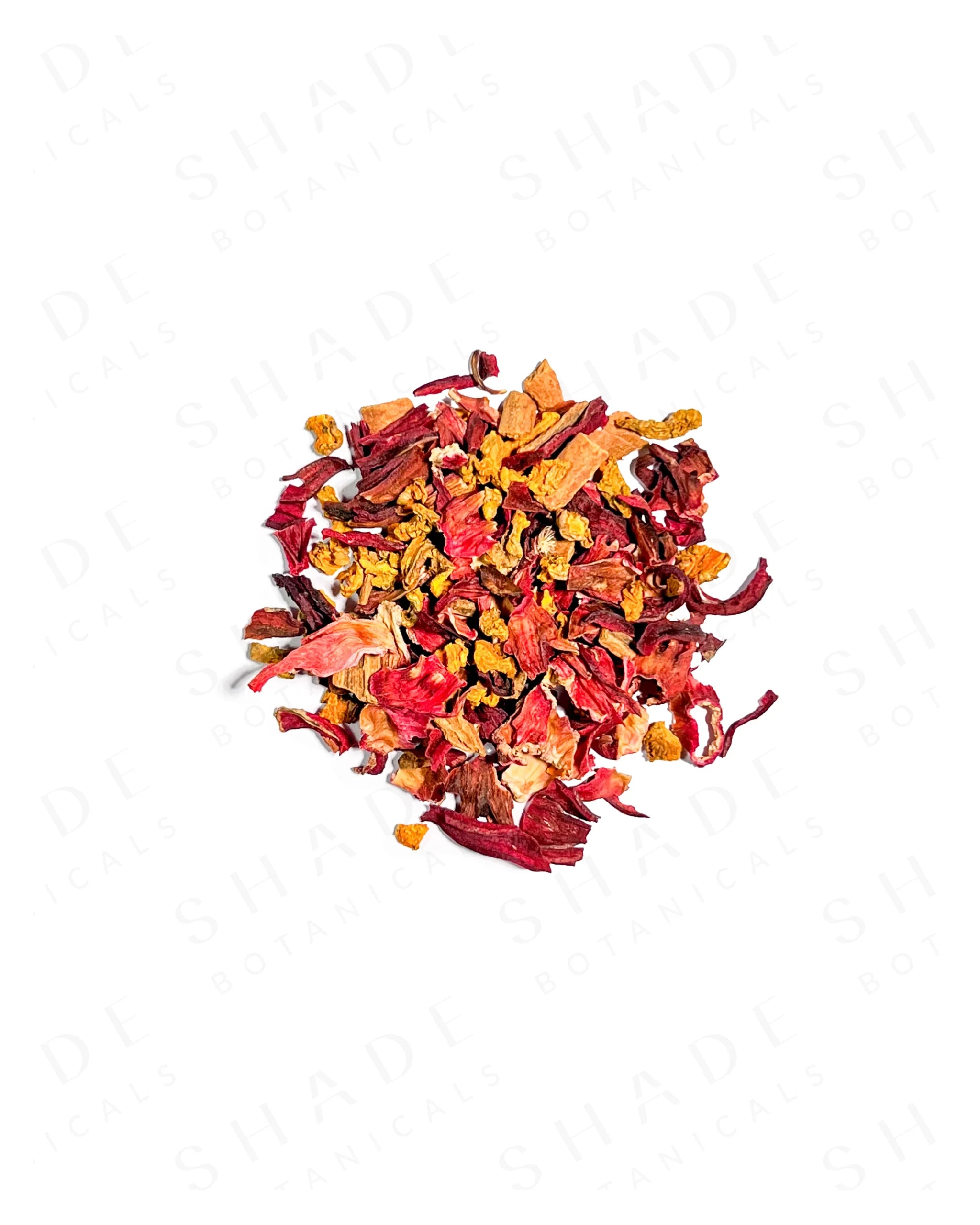 Colorful mix of dried flowers or herbs on a white background