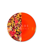 Top view of Shade Botanicals Golden Rosella travel pack with vibrant rosella tea blend color